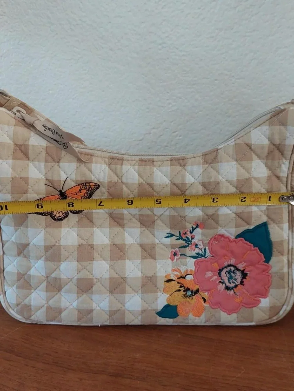 Vera Bradley Frannie Crescent Crossbody peach blossom picnic  is made from quilt